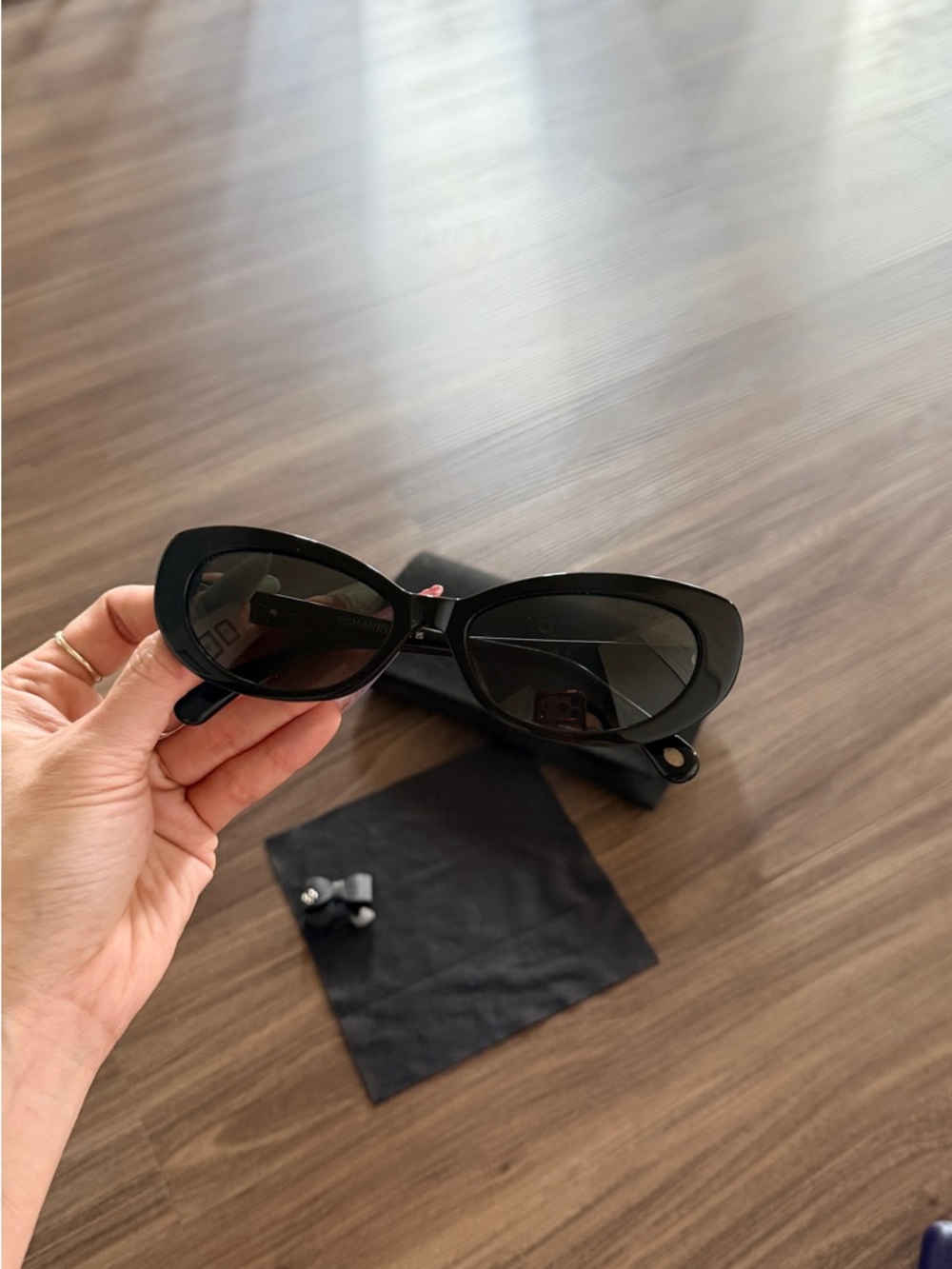 CHANEL Black Oval Sunglasses with Quilted Case and Bow Accent - Picture 5 of 6